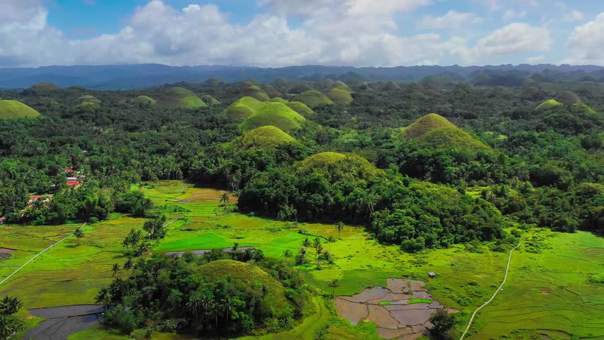 Aerial drone view Chocolate Hills and Rice Terraces Bohol Island, Philippines. High quality 4k footage