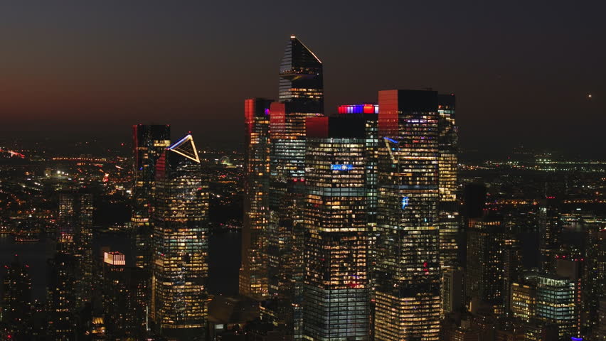 Aerial view of the Hudson Yards modern skyscraper complex, including The Edge, located on the West Side of Midtown Manhattan, New York City at night