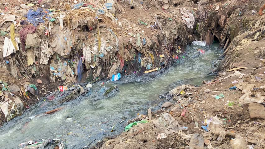 Pollution third world country fast fashion industry sewage water, garbage Bangladesh