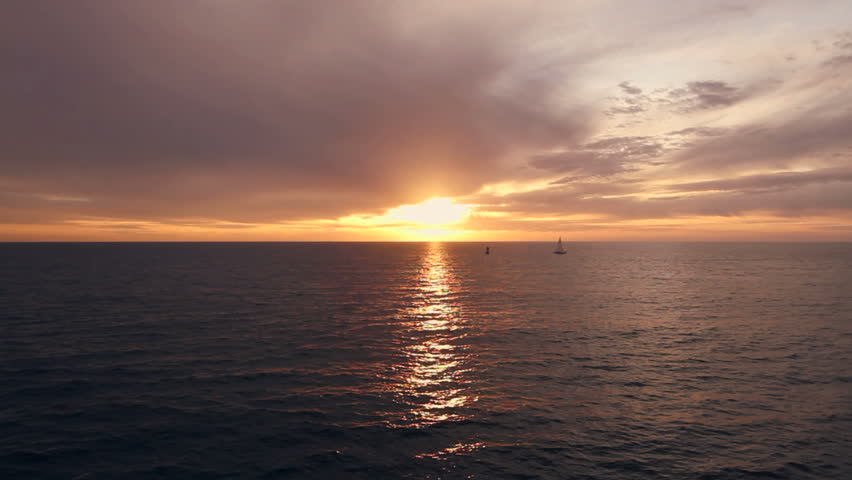 sunset over pacific ocean small sail Stock Footage Video (100% Royalty ...