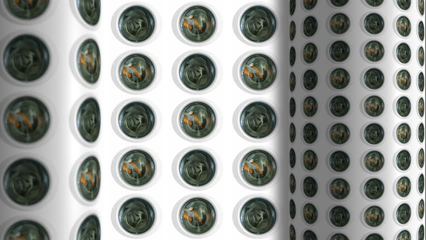 Surreal wall with rotating cylinders in front all covered in washing machine