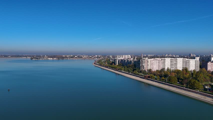 Rotating Aerial View of Lacul Morii in Crangasi Neighborhood, with Apartment Blocks in the Background, Sector 6, Bucharest, Romania