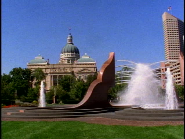 The Indiana State Capitol Building in Indianapolis with fountain in the foreground