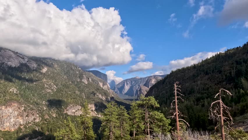 A Time-lapse of a cloudscape above Glacier National Park and hills