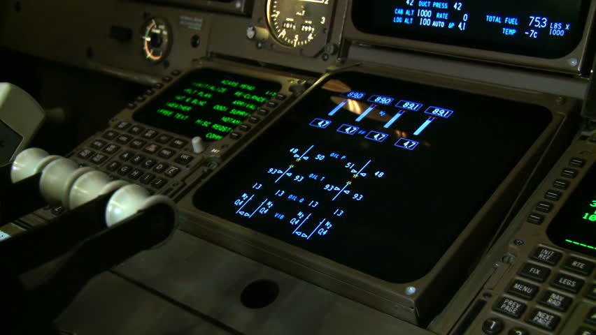 Detail of instruments in a Boeing 747 cockpit, shot with a hand-held camera.