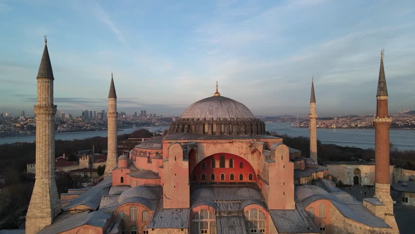 Hagia Sophia and Blue Mosque (Ayasofya ve Sultanahmet Cami) in the Sunset Lights Drone Video, Suleymaniye Fatih, Istanbul Turkiye (Turkey)
