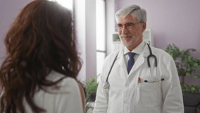 Doctor embracing woman in hospital room exemplifies warmth in healthcare setting, showcasing a positive interaction indoors - Powered by Shutterstock - Get 15% off with code: PIKWIZARD15