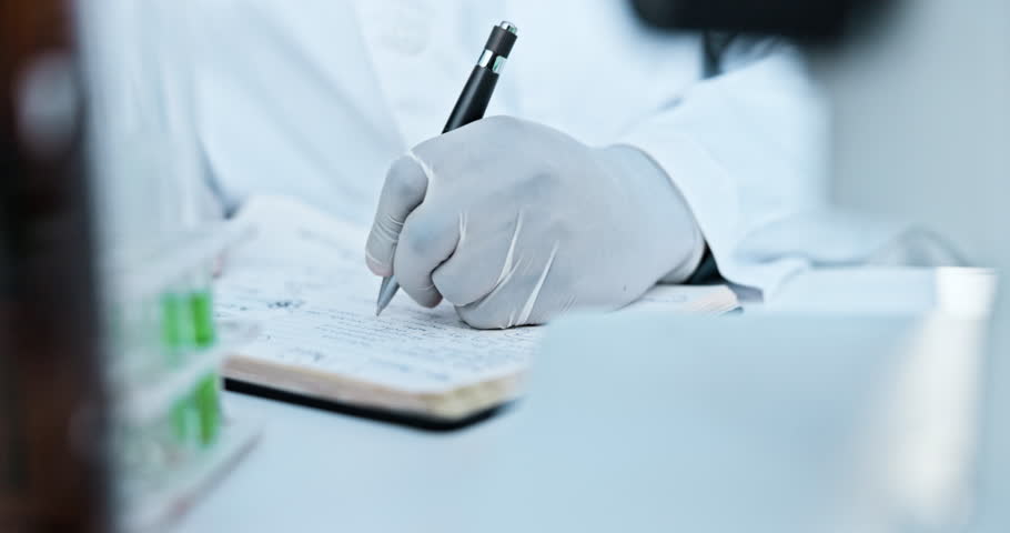Hand, writing notes and scientist in laboratory for experiment, test or project report. Pen, career and closeup of microbiologist working on pharmaceutical innovation with form, paperwork or document