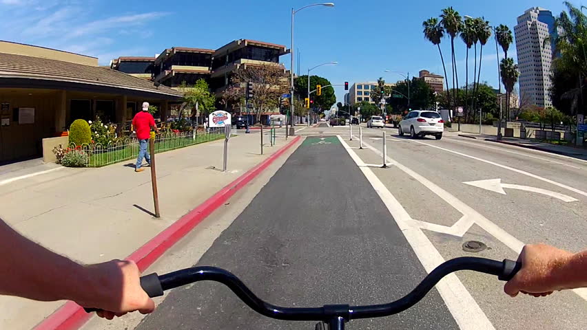 LONG BEACH, CA - APRIL 2, 2013: A point of view shot of someone riding a bicycle