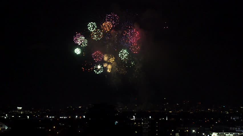 Nagaoka Fireworks Festival over city skyline in Nagaoka, Niigata, Japan