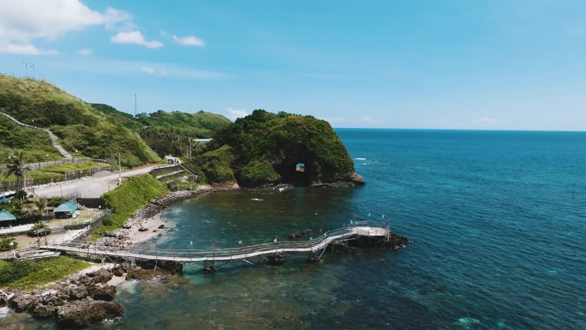 Majestic Bantay Abot Cave beside Windmills Farm , 4K Drone In Ilocos Norte Philippine