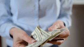 Woman opens red wallet and it is empty - Powered by Shutterstock - Get 15% off with code: PIKWIZARD15