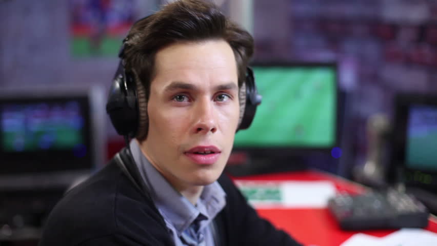 Man surprised. Radio Dj or sport event presenter takes off headphones stunned.