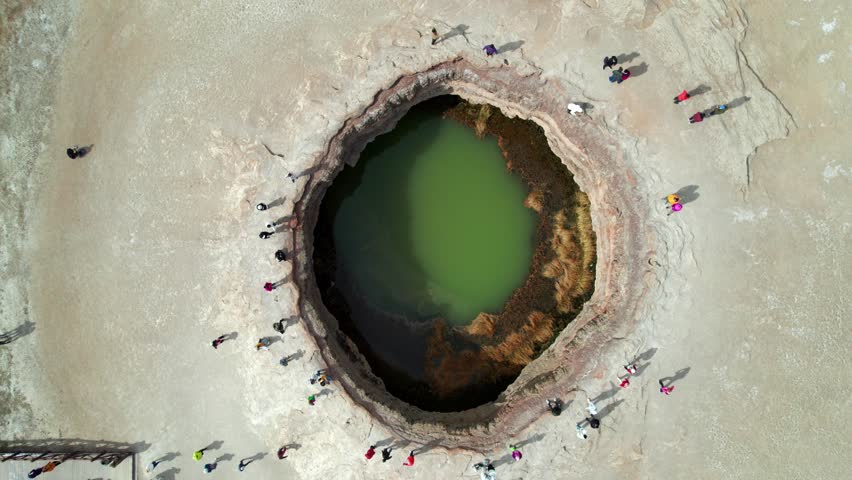 Drone view of Muji volcano crater in Muji, Akto county, Kashgar, Southern Xinjiang, China. Aerial landscape of natural landmark on Pamir plateau, 4k real time footage, travel concept.