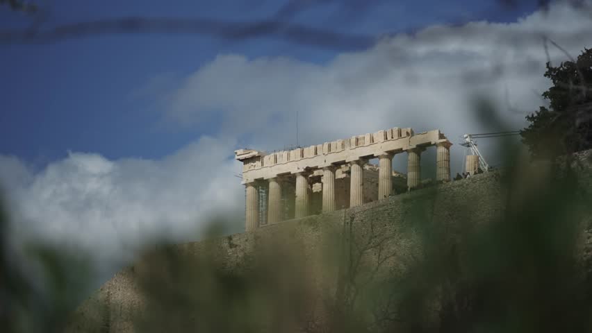 Ancient Greek temple Parthenon at Acropolis in Athens, Greece. Acropolis is an ancient citadel located on a rocky outcrop above the city of Athens.