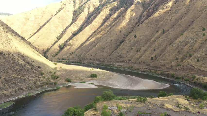 Salmon River in Riggins, Idaho, a popular location for rafting and fishing. Drone flying forward.