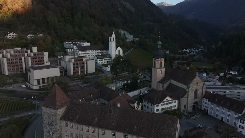 Drone flight over the Chur Cathedral and surrounding buildings in the old town of Chur, Switzerland.