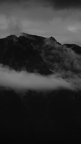 Captivating and Mysterious Mountain Landscape Rendered in Elegant Black and White Styles