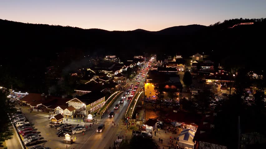 Static drone shot of Helen, Georgia at night.