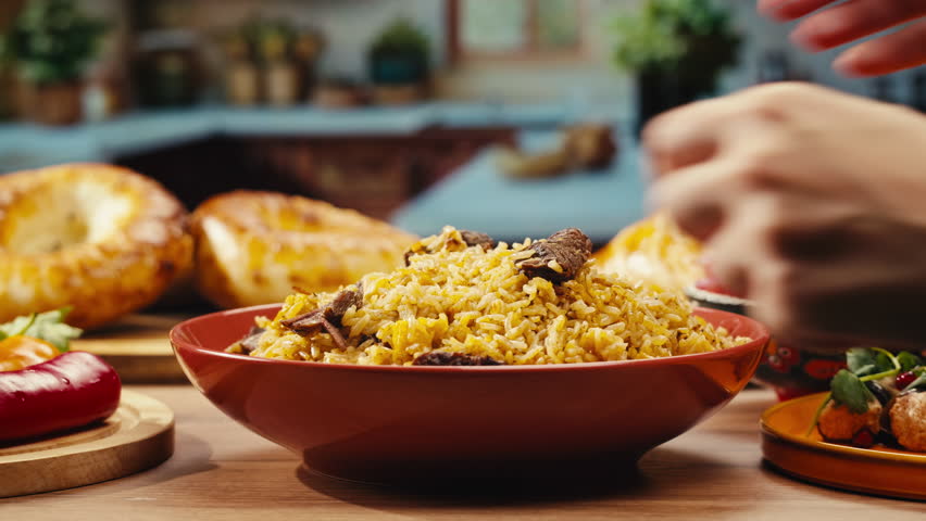 Middle eastern national traditional food, pilaf rice plov, samsa, Kabsa, dolma, tabbouleh close-up, rice and meat dish, d. Muslim family dinner, Ramadan, iftar. Kazakh Uzbek Arabian cuisine.