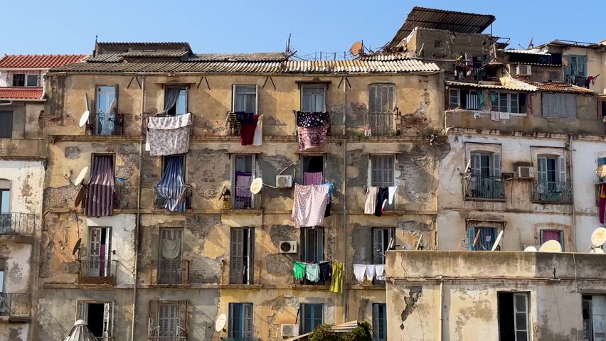 Old French colonial buildings in Casbah Alger Algiers poor living conditions weak buildings risky abandoned in North Africa capital metro city of Algeria