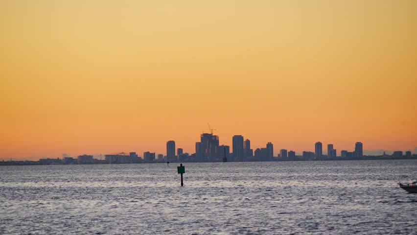 St Petersburg, Florida USA - Nov 02, 2024: St Petersburg Downtown city skyline and skyscraper seen from Apollo Beach Eg Simmons regional park landscape