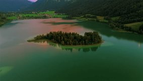 Aerial view of Lake Schliersee in the Bavarian alps in Germany. Luftaufnahme Schliersee ist ein See in den bayerischen Alpen im Landkreis Miesbach, Deutschland. Drone view Lake Schliersee at summer.  - Powered by Shutterstock - Get 15% off with code: PIKWIZARD15