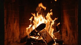 Burning Fireplace Providing Warmth and Comfort. Flames Dancing and Creating a Warm Glow in a Cozy Fireplace, Perfect for a Winter Evening, Christmas or New Year's Eve Celebration - Powered by Shutterstock - Get 15% off with code: PIKWIZARD15