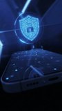 Cybersecurity shield icon hologram and smartphone. Data protection and privacy or antivirus concept. Finance data or VPN service protection. Blockchain and secure crypto wallet mobile app - Powered by Shutterstock - Get 15% off with code: PIKWIZARD15