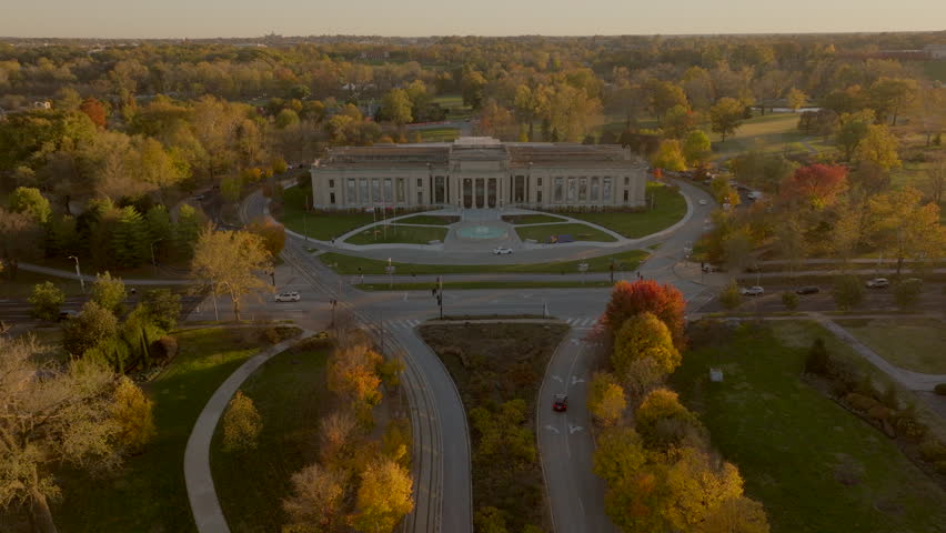 Aerial flyover the Missouri History Museum in Forest Park at sunset in Autumn.