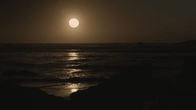 Strawberry Moon - rare event of the special solstice Full Moon in June 2024. Beautiful lunar path on the calm - Powered by Shutterstock - Get 15% off with code: PIKWIZARD15