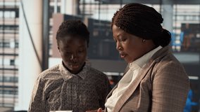 Businesspeople colleagues strategize a plan at a modern workplace, focusing on company goals by developing a sustainable enterprise strategy to achieve corporate success and objectives. Camera A. - Powered by Shutterstock - Get 15% off with code: PIKWIZARD15