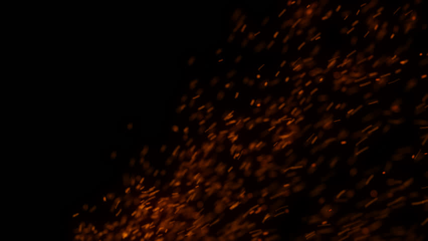 Abstract bokeh of VFX Dust Particles Floating On Black Background. Natural Dust Fire Burn Particles Randomly Float in Space. Shimmering Glittering Dust Particles With Bokeh.