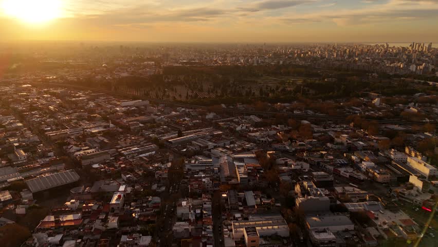 A yellow sunset falls over the Chacarita Cemetery in Buenos Aires, Argentina.