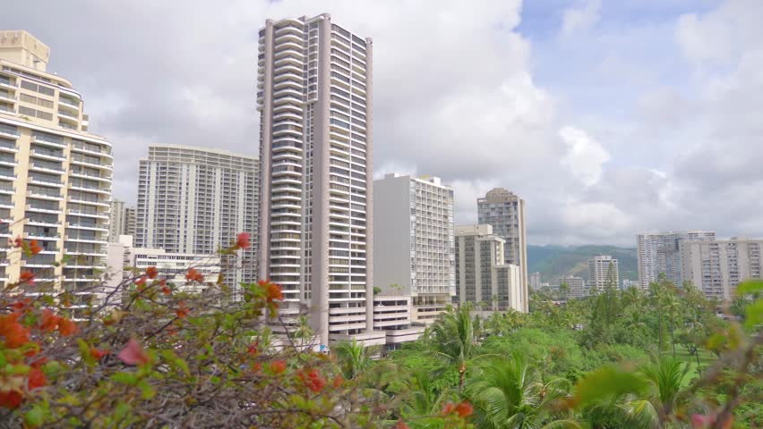 Panoramic view of Honolulu city with lush greenery in Hawaii, USA in 4K slow motion 60fps