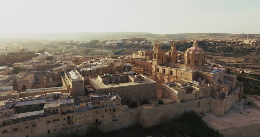 St. Paul's Cathedral in Mdina, Malta aerial view. Tourist streets of a historical European city with beautiful ancient architecture. High quality 4k footage