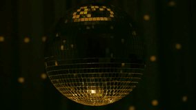Exciting disco ball reflecting vibrant lights at a lively party setting during the evening - Powered by Shutterstock - Get 15% off with code: PIKWIZARD15