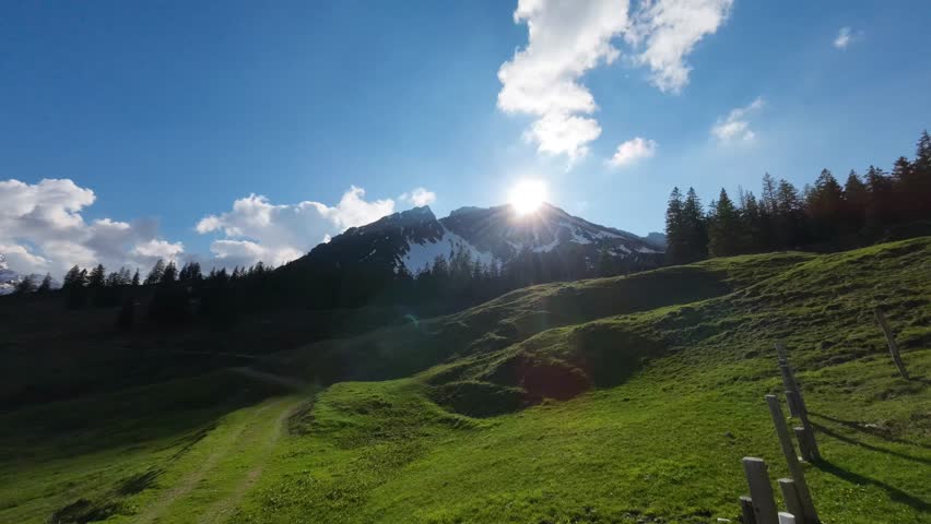 Timelapse of Clouds in Austrian Mountain Landscape surrounded by Forest.
Vorarlberg, Austria