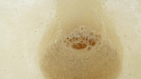 Close-up effervescent tablet vitamin, white pill dissolves with bubbles, round bubbling aspirin in water, slow motion - Powered by Shutterstock - Get 15% off with code: PIKWIZARD15