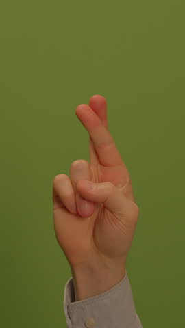 The Fingers Crossed Gesture as a Symbol for Good Luck and Hopeful Aspirations Ahead