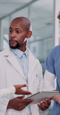 Tablet, consulting and leader with doctors in hospital for advice, healthcare and digital patient files. Telehealth, medical report and helping with people in clinic for research, nurse and expert