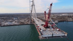 Large Cable-Stayed Bridge Under Construction - Gordie Howe international bridge connecting Detroit Michigan to Windsor Canada over the Detroit River - Powered by Shutterstock - Get 15% off with code: PIKWIZARD15