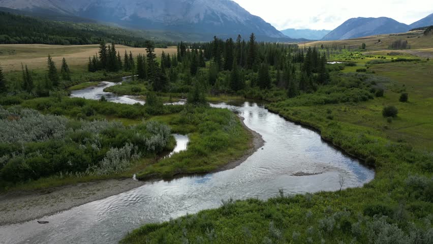 Winding River Through Mountain Valley. Alberta, Canada.