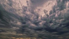 timelapse clip of heavy gray snow or rain clouds at sunrise - Powered by Shutterstock - Get 15% off with code: PIKWIZARD15
