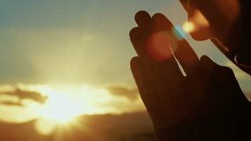 christian man prays with hands clasped - Powered by Shutterstock - Get 15% off with code: PIKWIZARD15