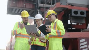 Group of professional dock worker and engineering people taking with their supervisor while record data online with digital laptop at warehouse logistic in cargo freight ship for import and export - Powered by Shutterstock - Get 15% off with code: PIKWIZARD15