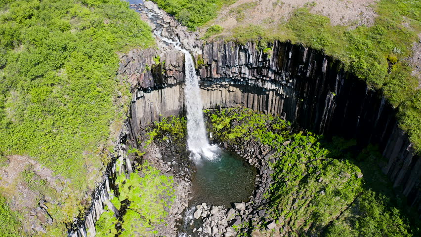 Aerial view of the spectacular Svartifoss waterfall, into the Skaftafell area of Vatnajokull National Park provides visitors with a breathtaking view of Svartifoss (Black Falls).