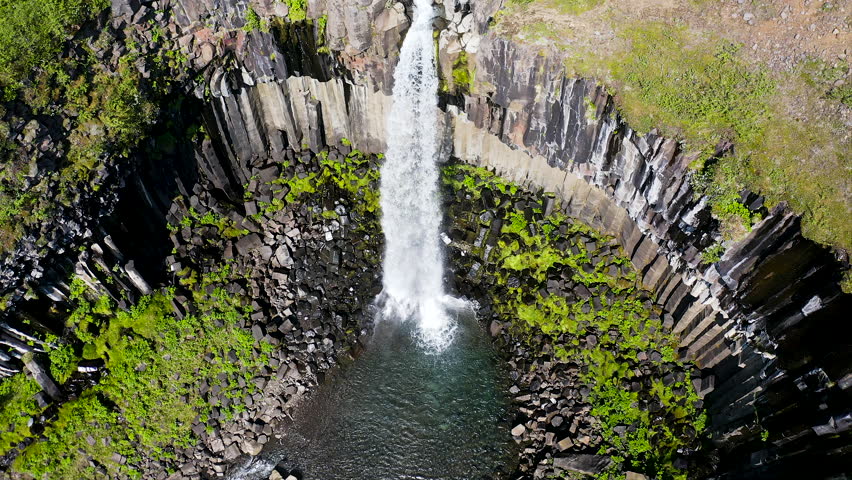 Aerial view of the spectacular Svartifoss waterfall, into the Skaftafell area of Vatnajokull National Park provides visitors with a breathtaking view of Svartifoss (Black Falls).