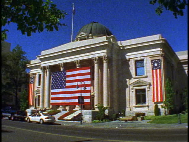 Reno County Courthouse with huge United States flag covering the front