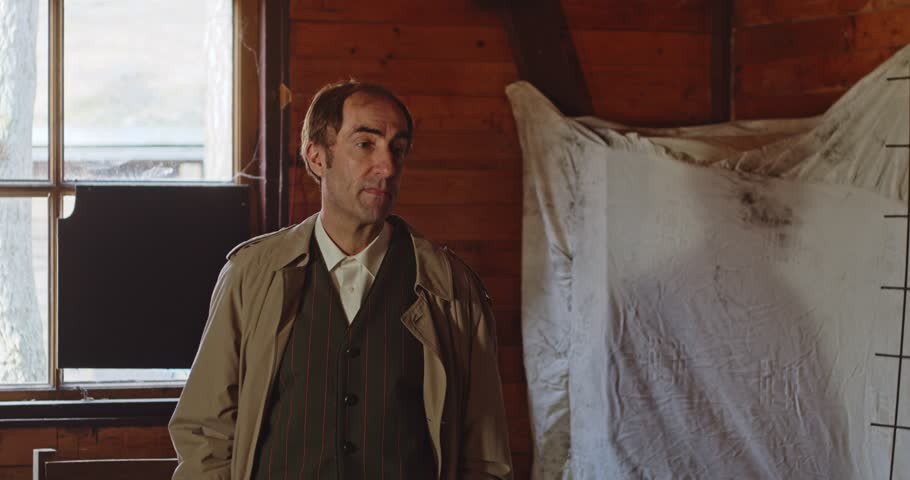 World War 2 era concept - A civilian resistance fighter walks up to a spy and they deliberate in front of a map